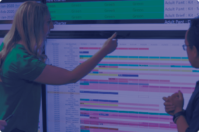 woman looking at chart with team